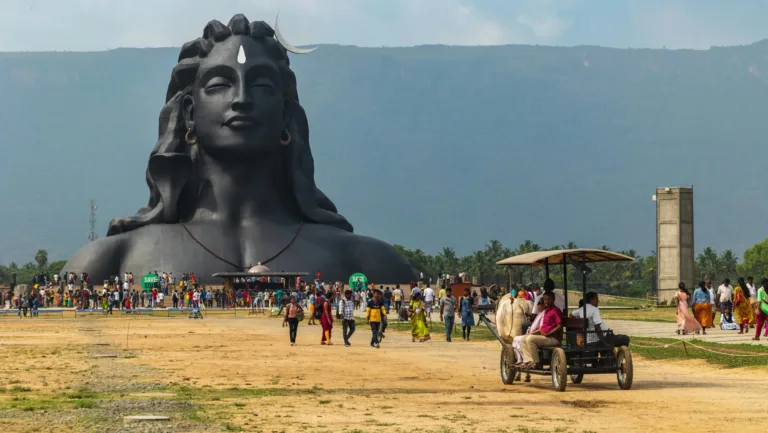 Adiyogi Shiva statue in Coimbatore – large bust sculpture with visitors in foreground